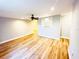 Spacious living room featuring beautiful wood floors and neutral paint at 3143 Phoenix Ave, Oldsmar, FL 34677