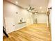 Open living room showcases wood floors, great lighting and high ceilings at 3143 Phoenix Ave, Oldsmar, FL 34677