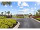 Inviting entrance to the River's Edge community with manicured landscaping and modern signage at 33750 Ocean Spray Ln, Wesley Chapel, FL 33543