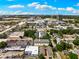 Aerial showing urban amenities, lush greenery, and convenient location of the property at 3702 W Cass St # 5, Tampa, FL 33609