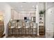 Kitchen with stainless steel appliances, granite countertops, and barstool seating at 3702 W Cass St # 5, Tampa, FL 33609