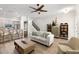 Spacious living room with light wood floors, open concept floor plan, and modern decor at 3702 W Cass St # 5, Tampa, FL 33609