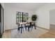 Bright dining area offering a view of the outdoors, ideal for everyday meals at 3923 Shoreside Cir, Tampa, FL 33624