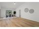 Bright dining area with a ceiling fan and a view to another room at 3923 Shoreside Cir, Tampa, FL 33624