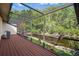 This screened lanai is the perfect place to enjoy the beautiful views of the water and lush foliage around the house at 3923 Shoreside Cir, Tampa, FL 33624