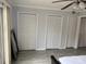 The bedroom features ample closet space, enhancing the room's functionality and storage at 4103 Gulf Blvd # 104, St Pete Beach, FL 33706