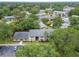 A peaceful condo community featuring lush trees, landscaping and a relaxing pool at 4215 E Bay Dr # 1005D, Clearwater, FL 33764