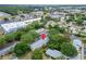Overhead angle of complex surrounded by lush greenery near retail and community spaces at 4215 E Bay Dr # 1005D, Clearwater, FL 33764