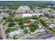 An aerial view of the property and neighborhood featuring easy access to nearby amenities at 4215 E Bay Dr # 1005D, Clearwater, FL 33764