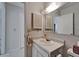 Bathroom sink and vanity provide ample storage in a well-lit space at 4215 E Bay Dr # 1005D, Clearwater, FL 33764