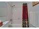 Bathroom featuring a shower and decorative shower curtain at 4215 E Bay Dr # 1005D, Clearwater, FL 33764