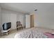 Bedroom with a queen-size bed, tile flooring, and closet space at 4215 E Bay Dr # 1005D, Clearwater, FL 33764