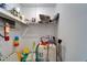 Storage area featuring organized shelving and various maintenance items, providing practical space for household supplies and tools at 4215 E Bay Dr # 1005D, Clearwater, FL 33764