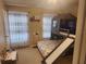 Charming bedroom with unique bunk bed featuring a built-in slide and decor at 4537 Kennewick Pl # 4537, Riverview, FL 33578