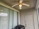Outdoor patio with a ceiling fan, sliding glass doors and a modern grill at 4537 Kennewick Pl # 4537, Riverview, FL 33578
