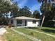 Inviting single-story home with a classic brick exterior and a neatly landscaped front yard at 4819 21St S Ave, St Petersburg, FL 33711