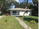 Charming single-story home with a traditional brick facade and a well-maintained front lawn at 4819 21St S Ave, St Petersburg, FL 33711