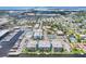 Expansive aerial view of waterfront condos near marina with boat docks at 4904 38Th S Way # 514, St Petersburg, FL 33711