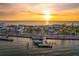 Beautiful aerial view of the coastal community at sunset featuring ocean and bay access at 4904 38Th S Way # 514, St Petersburg, FL 33711