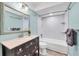 Modern bathroom featuring a marble shower, sleek vanity, and updated fixtures at 4904 38Th S Way # 514, St Petersburg, FL 33711