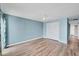 Minimalist bedroom with wood floors, double closets, and a light and airy ambiance at 4904 38Th S Way # 514, St Petersburg, FL 33711