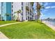 Lush landscaping surrounds waterfront condos with lawn to the seawall at 4904 38Th S Way # 514, St Petersburg, FL 33711