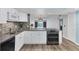 Well-lit kitchen with stylish countertops and stainless steel appliances at 4904 38Th S Way # 514, St Petersburg, FL 33711