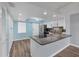 Well-equipped kitchen with cooktop island, ample storage, and stainless steel appliances at 4904 38Th S Way # 514, St Petersburg, FL 33711
