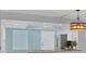 Bright and modern kitchen with stainless steel appliances and an island cooktop at 4904 38Th S Way # 514, St Petersburg, FL 33711