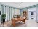 Bright home office with natural light, wood floors, desk, and decor at 4904 38Th S Way # 514, St Petersburg, FL 33711