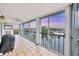 Large patio with floor to ceiling windows overlooking a tranquil waterway at 4904 38Th S Way # 514, St Petersburg, FL 33711
