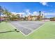Well-maintained tennis court at a condo complex with lush surrounding landscape at 4904 38Th S Way # 514, St Petersburg, FL 33711