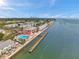 Scenic aerial shot of condos with marina, a pool, pier and water views at 5260 Coquina Key Se Dr # C, St Petersburg, FL 33705