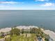 Stunning aerial view of waterfront condos with easy beach access and beautiful water views at 5260 Coquina Key Se Dr # C, St Petersburg, FL 33705