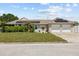 Charming single-story home with well-maintained landscaping, a neatly manicured lawn, and solar panels at 5401 3Rd N Ave, St Petersburg, FL 33710