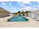Large backyard pool surrounded by spacious patio for lounging in a private tropical backyard at 5401 3Rd N Ave, St Petersburg, FL 33710