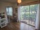 Relaxing lanai with seating, offering a serene outdoor retreat with views of the surrounding greenery at 5705 80Th N St # 303, St Petersburg, FL 33709