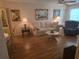 Bright and inviting living room with comfortable seating, ideal for relaxation and entertaining at 5705 80Th N St # 303, St Petersburg, FL 33709