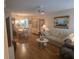 Cozy living room featuring classic decor and hardwood floors, creating a welcoming atmosphere at 5705 80Th N St # 303, St Petersburg, FL 33709
