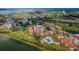 Community featuring a pool, clubhouse and access to a golf course at 6158 Palma Del Mar S Blvd # 306, St Petersburg, FL 33715