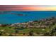 Beautiful community overlooking the water, golf course, and colorful sunset at 6158 Palma Del Mar S Blvd # 306, St Petersburg, FL 33715