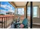 Balcony featuring tile floors and two chairs with views of the surrounding neighborhood at 6158 Palma Del Mar S Blvd # 306, St Petersburg, FL 33715