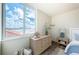 Bedroom with a dresser with large window and view of the intercostal and ocean at 6158 Palma Del Mar S Blvd # 306, St Petersburg, FL 33715