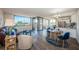 Cozy living room with hardwood floors and floor to ceiling windows at 6158 Palma Del Mar S Blvd # 306, St Petersburg, FL 33715