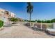 Exterior patio with seating, view, and landscaping at 6158 Palma Del Mar S Blvd # 306, St Petersburg, FL 33715