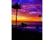 Enjoy gorgeous sunsets by the pool, surrounded by palm trees and tranquil waters at 6158 Palma Del Mar S Blvd # 306, St Petersburg, FL 33715