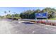 Isla del Sol / Palma Del Mar community sign with landscaping at 6158 Palma Del Mar S Blvd # 306, St Petersburg, FL 33715