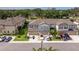 Overhead photo captures the charming townhomes, each with a garage and landscaped entrance at 6542 95Th N Pl, Pinellas Park, FL 33782