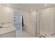 Bright bathroom features double vanity, soaking tub, and glass-enclosed shower at 6542 95Th N Pl, Pinellas Park, FL 33782