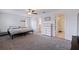 Spacious main bedroom with carpet floors, ceiling fan, and natural light at 6542 95Th N Pl, Pinellas Park, FL 33782